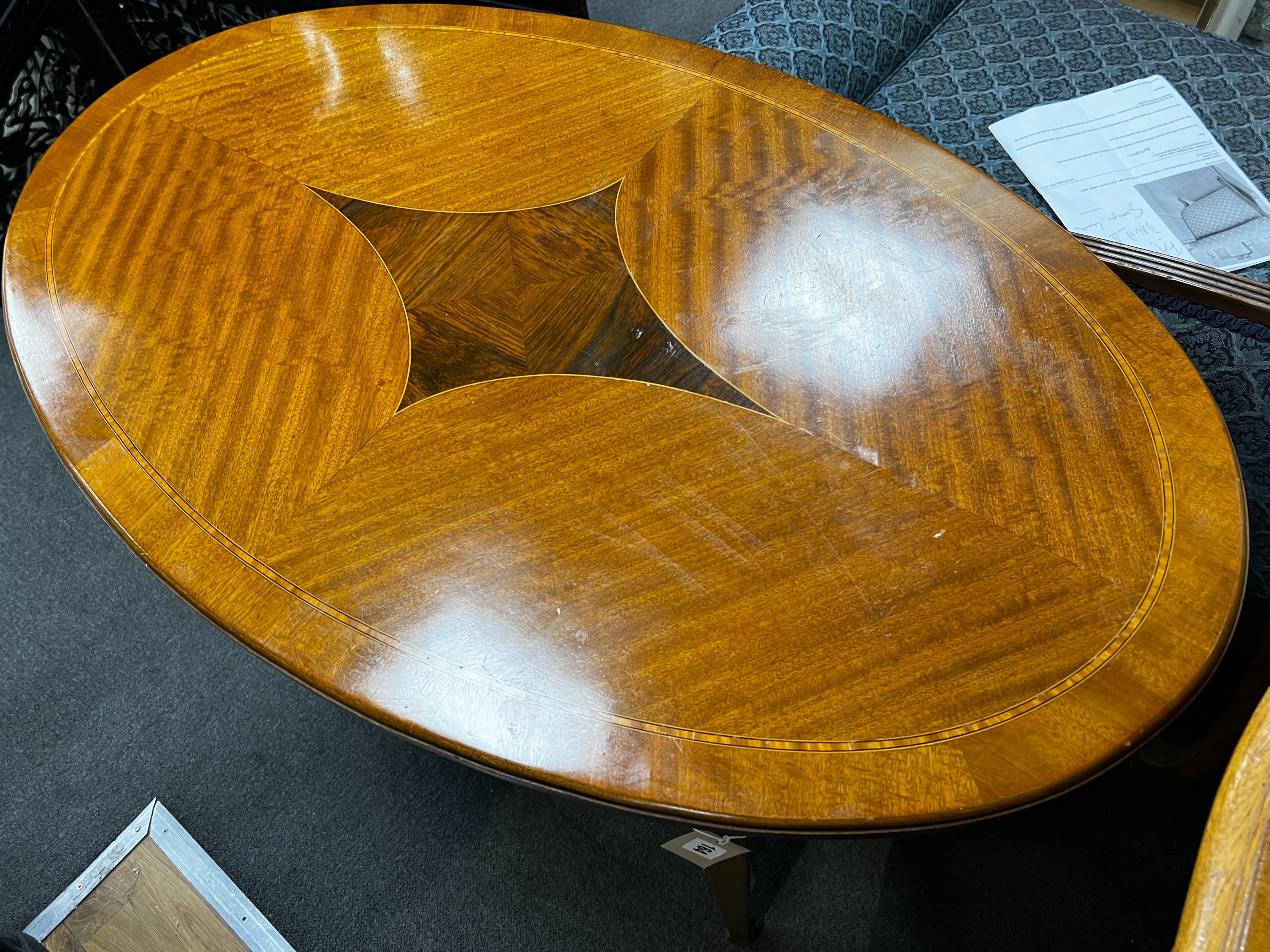 An Edwardian satinwood banded oval satinwood two tier centre table, width 98cm, depth 60cm, height 73cm